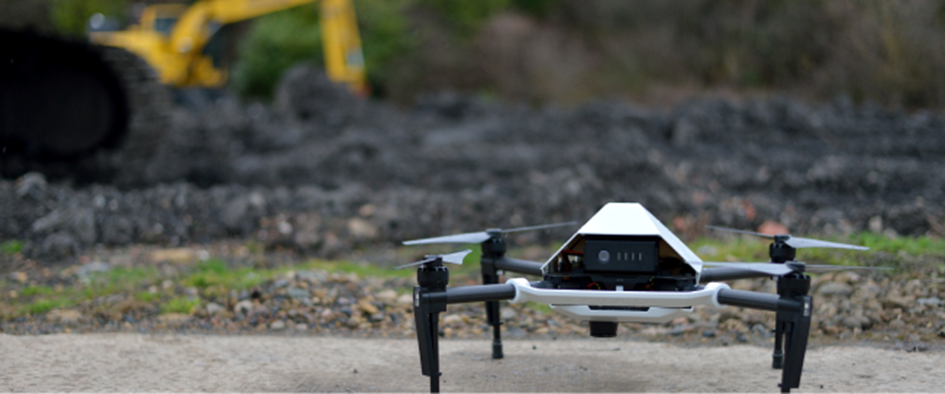 Smart Construction Drone standing stationary on the ground ready for take-off
